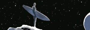 Silver Surfer stands on a planet with black sky holding his surf board. 